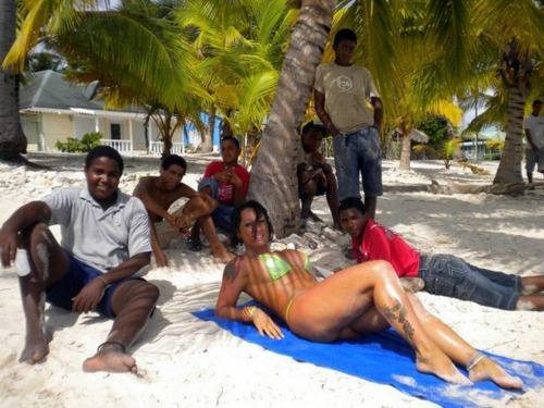 White Wife Surrounded on Beach